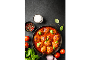 Meatballs in tomato sauce in iron, a Food & Drink Photo by Nadia-nb