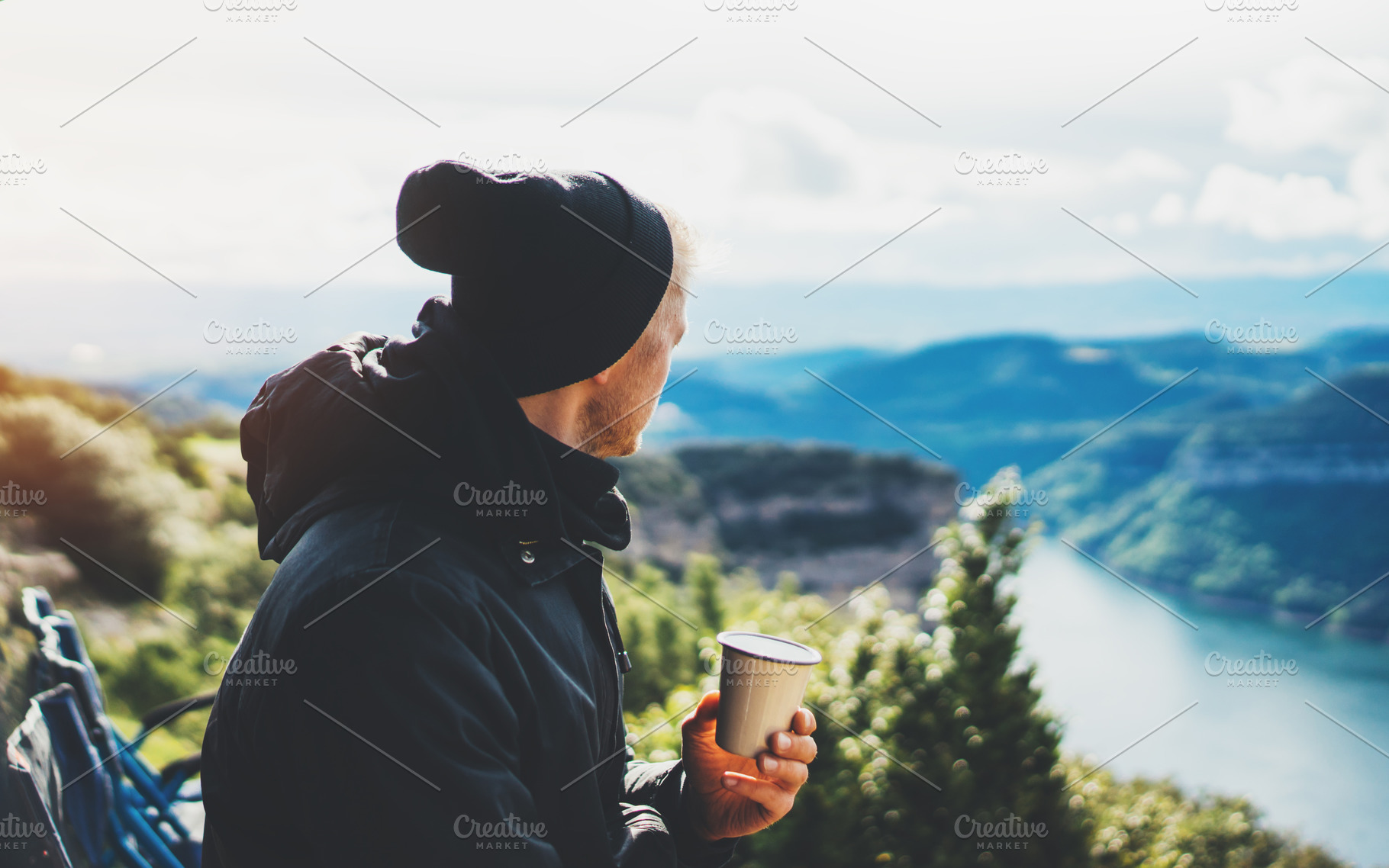 A cup of hot coffee in nature stock photo containing hands and holding, a Person Photo by A_B_C