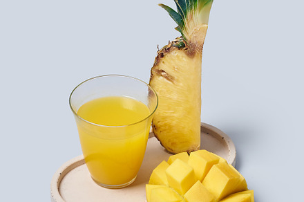 Tropical fruits variety on a colorful background. Side view with