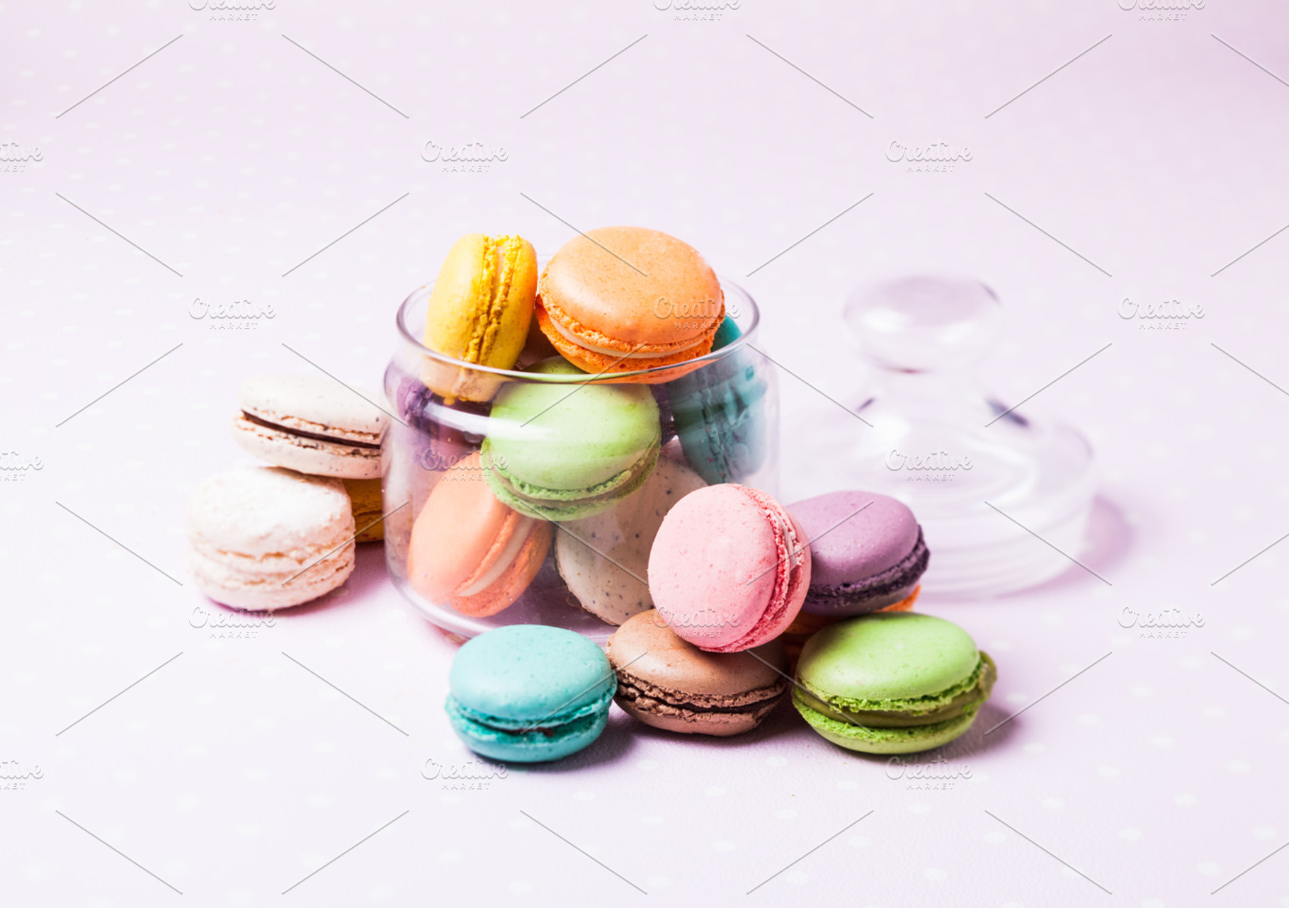Colorful macaroons featuring assorted, assortment, and background, a Food & Drink Photo by oksix