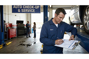 Worker Checks Car, an Industrial Photo by CREATIVEDEF