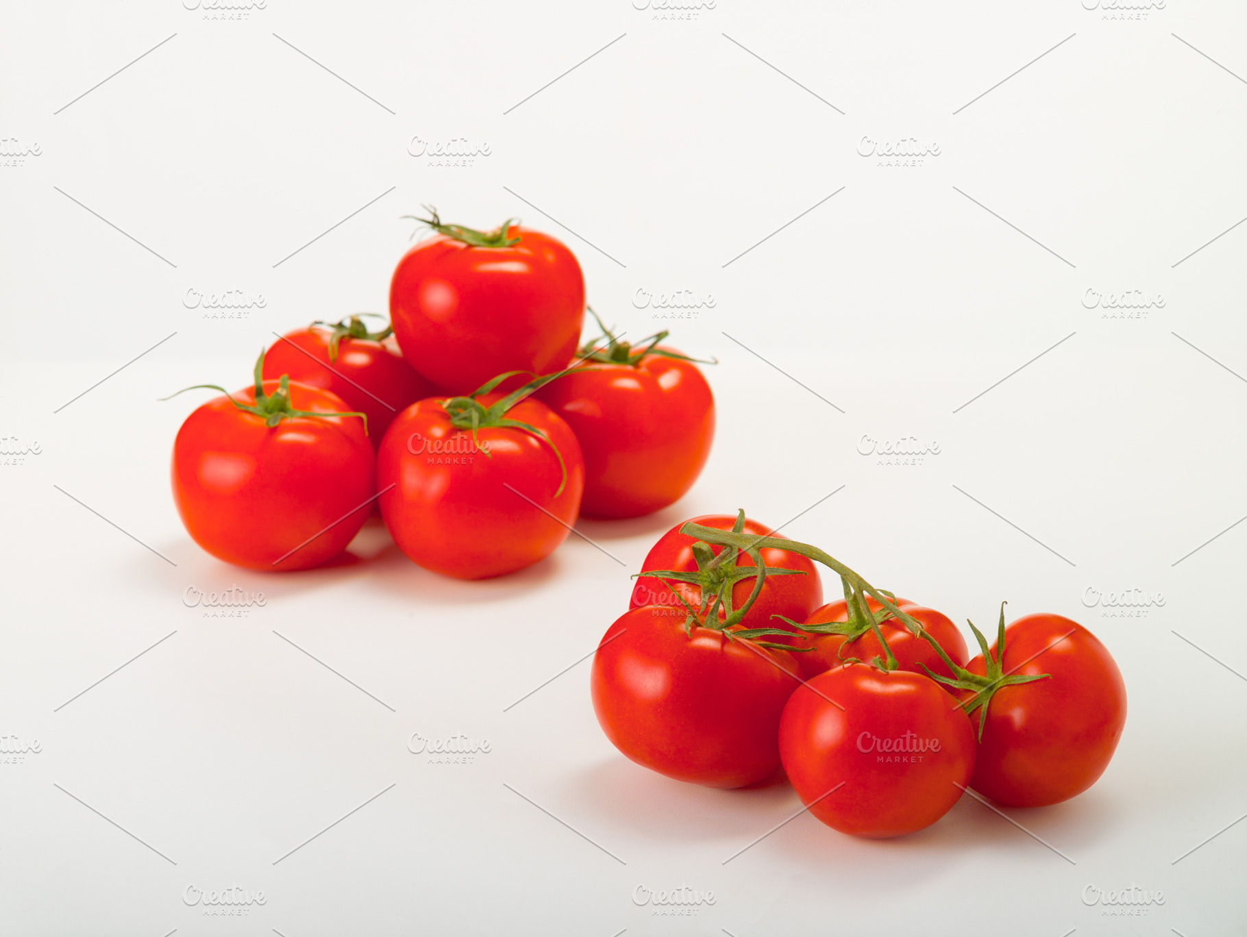Red tomatoes fresh harvest on a whit stock photo containing vegetable and, a Food & Drink Photo by oleghz