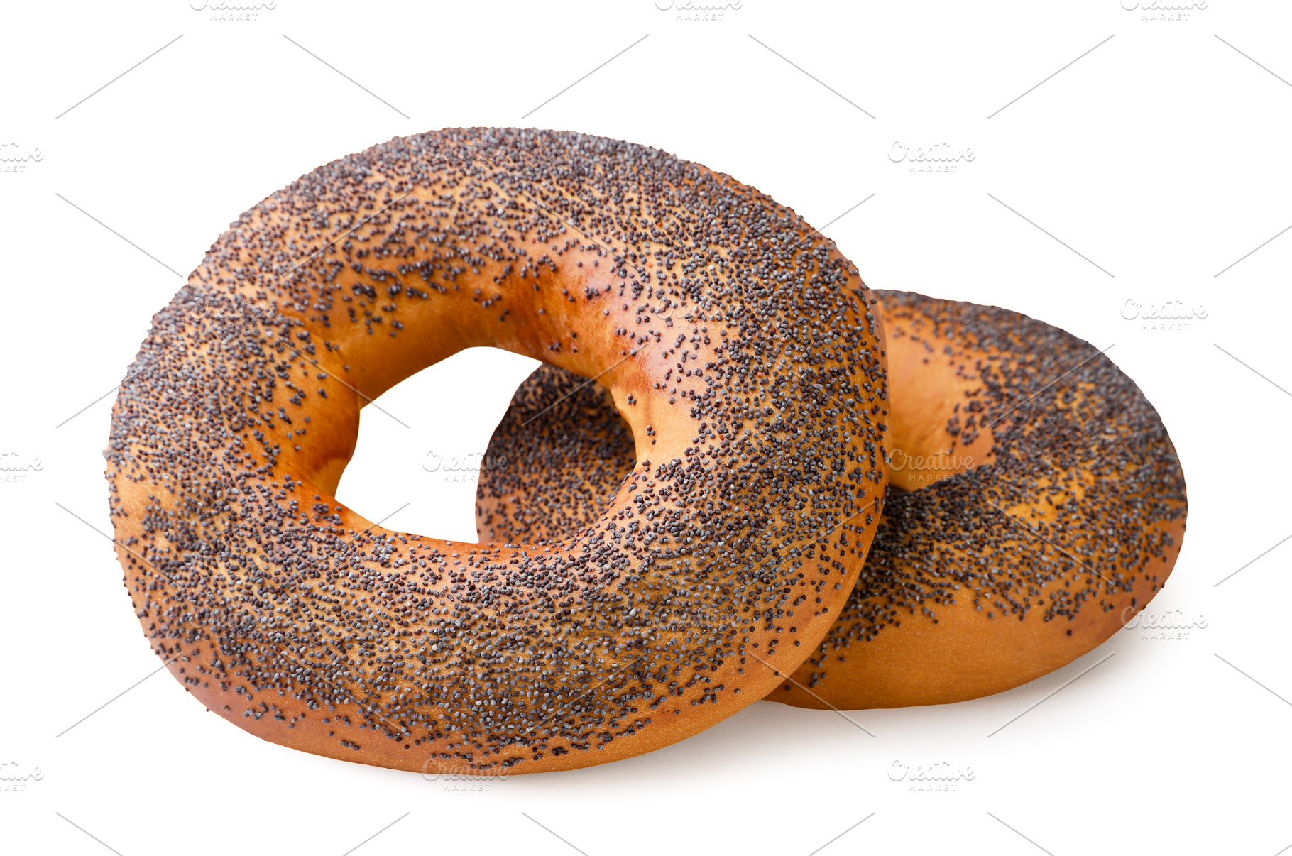 Two bagels with poppy seeds on a, a Food & Drink Photo by innakreativ