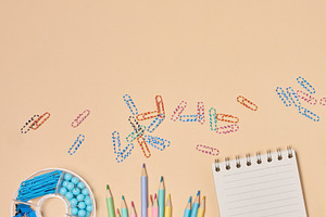 Flat lay of colorful school and office supplies including pencil, a School & Education Photo by ndanko