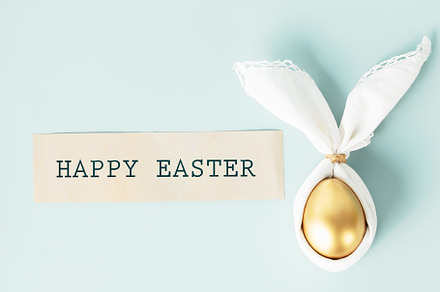 Stylish Easter flat lay with golden egg in easter bunny napkin,, a Holiday Photo by Natalia Klenova's Shop