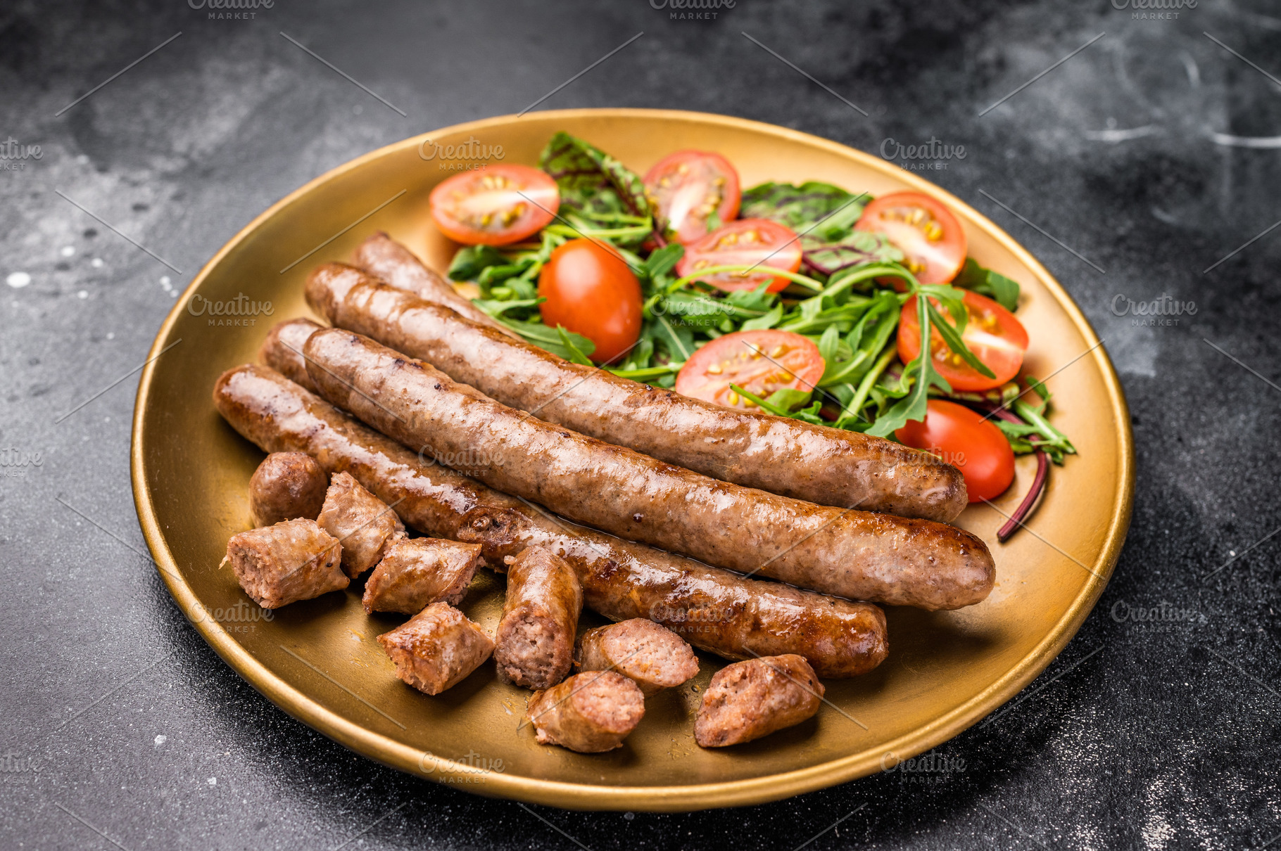 Close up of perfectly charred grilled sausage with salad, ideal, a Food & Drink Photo by composter-box@mail.ru
