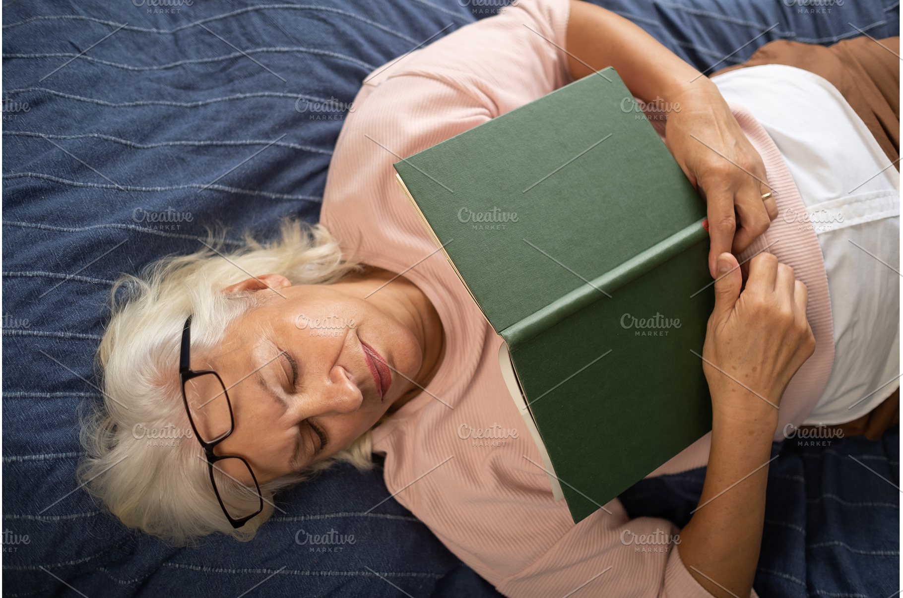 senior woman lying on sofa and, a Person Photo by Koldunov