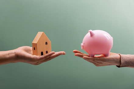Financial Goals Cocept, Buying a New House with Savings Money. t, a Business Photo by salmon.black