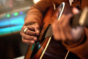 Strumming away, a Photo by Peopleimages.com