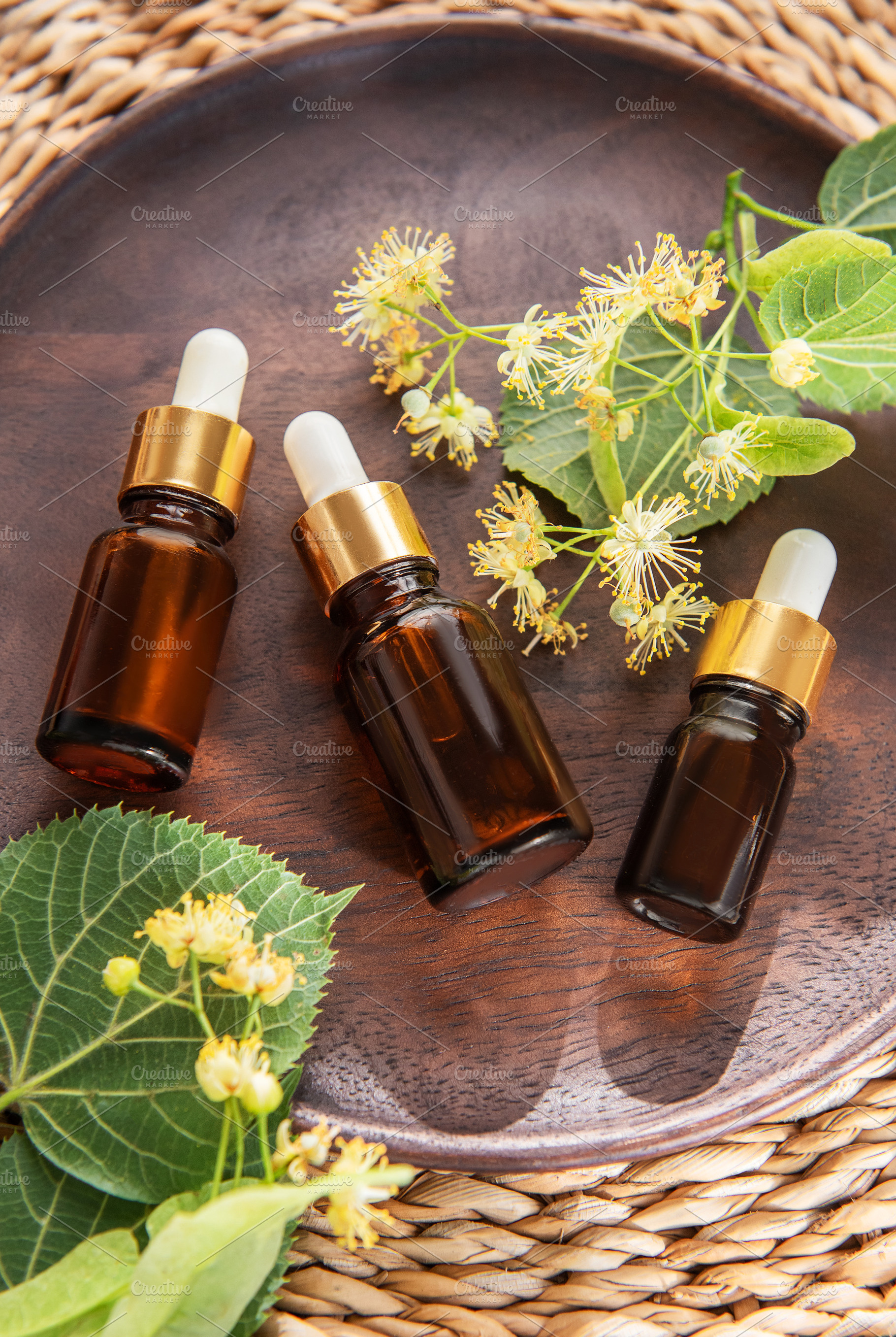 Linden essential oil dropper bottles for natural aromatherapy, a Health & Medical Photo by Olena Rudo