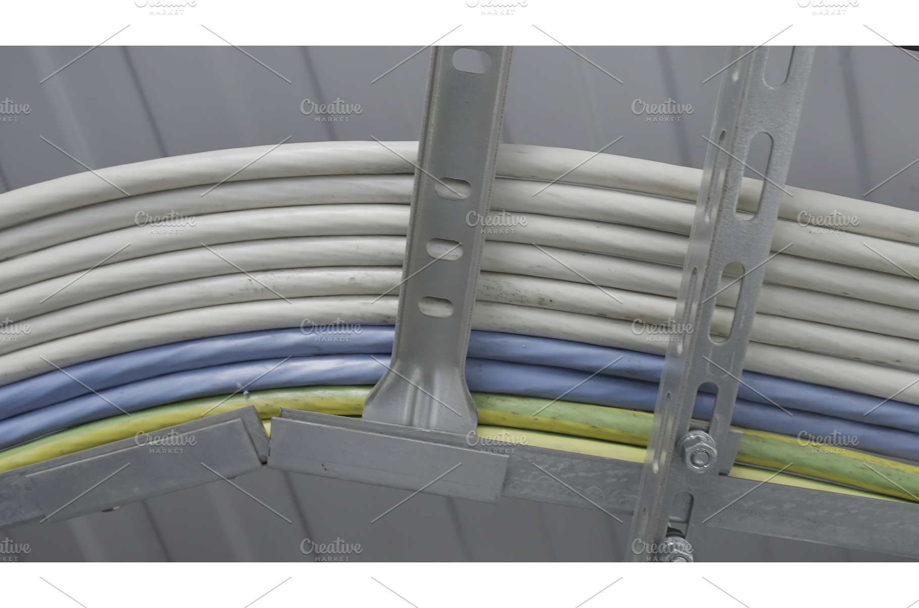 Cables on metal racks. Action, a Technology Photo by Media Whale Stock