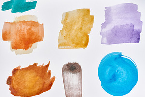 Multicolored watercolor brushstrokes and spots of various shapes, an Abstract Photo by ndanko