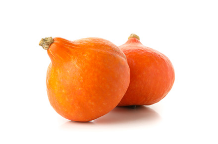 Two orange pumpkins isolated on white background, a Food & Drink Photo by AtlasStudio PRO