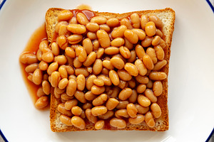 Homemade English Beans on Toast, top view. Close-up., a Food & Drink Photo by LiudmylaChuhunova