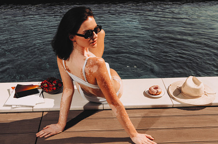 Beautiful girl by the pool, a Person Photo by BUTKO Magazine
