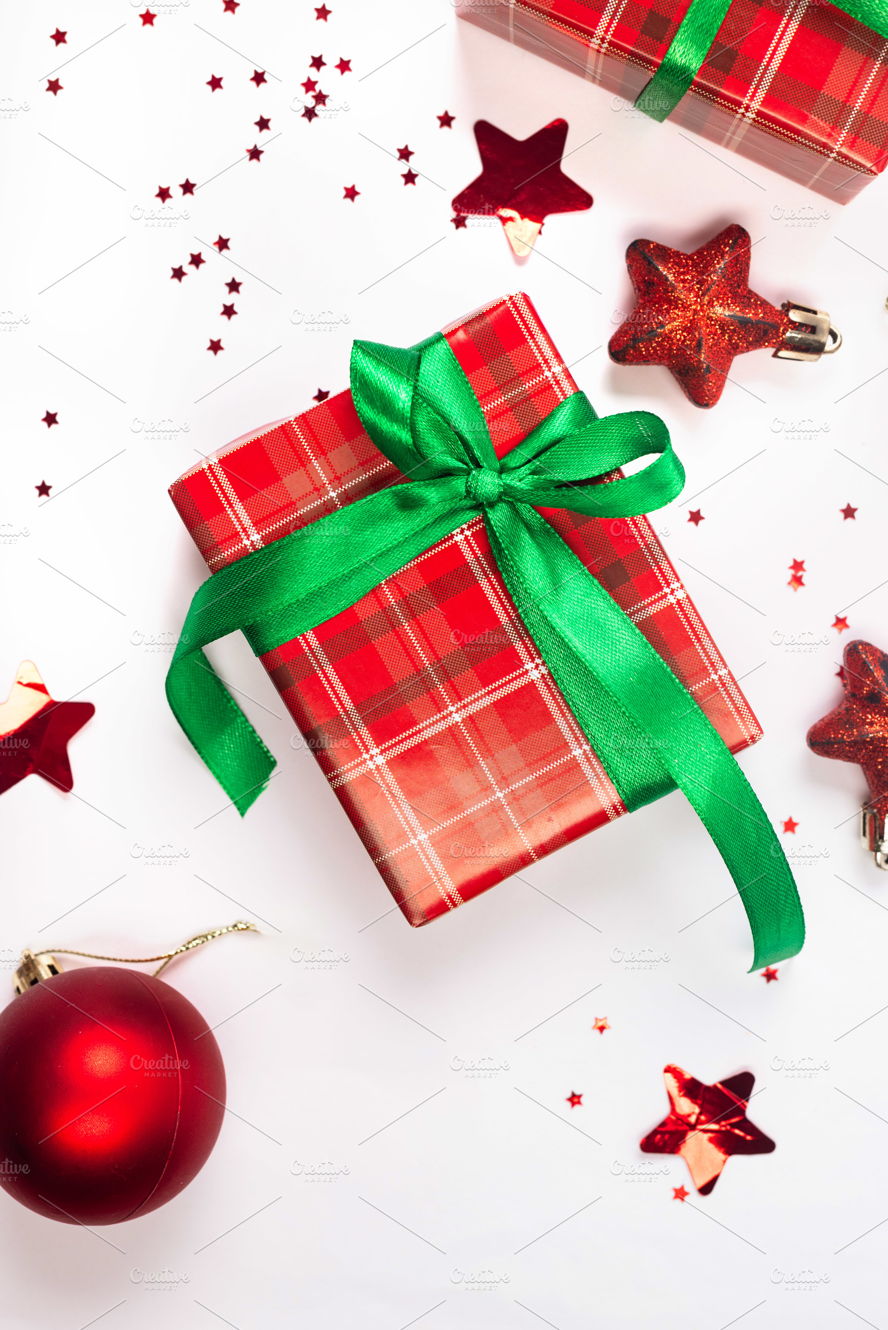 Christmas composition. Red gift boxes with green ribbon at white, a Holiday Photo by vimart