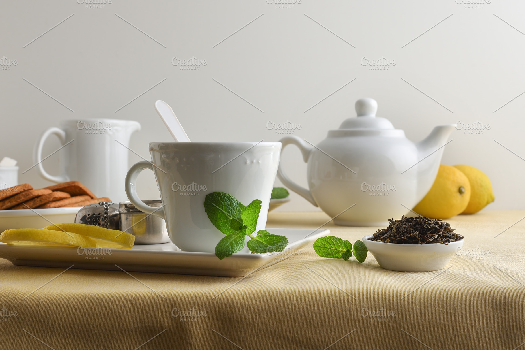 White ceramic tea set with ingredients and white isolated backgr, a Food & Drink Photo by Davizro's Market