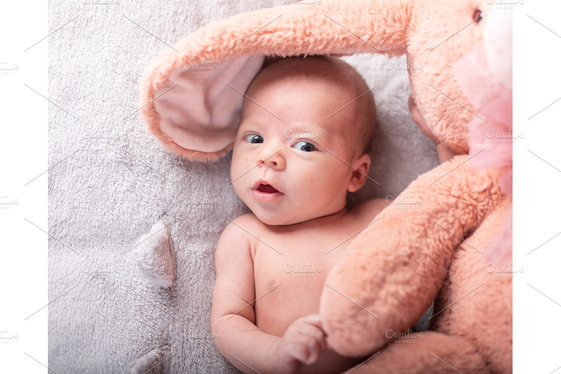 Pretty smiling baby girl and toy stock photo containing baby and childhood, a Person Photo by coob.kz