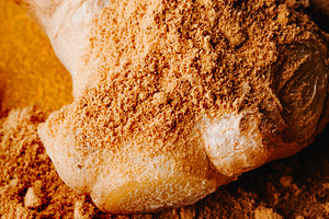 fresh ginger covered with ground spice, a Photo by Nito