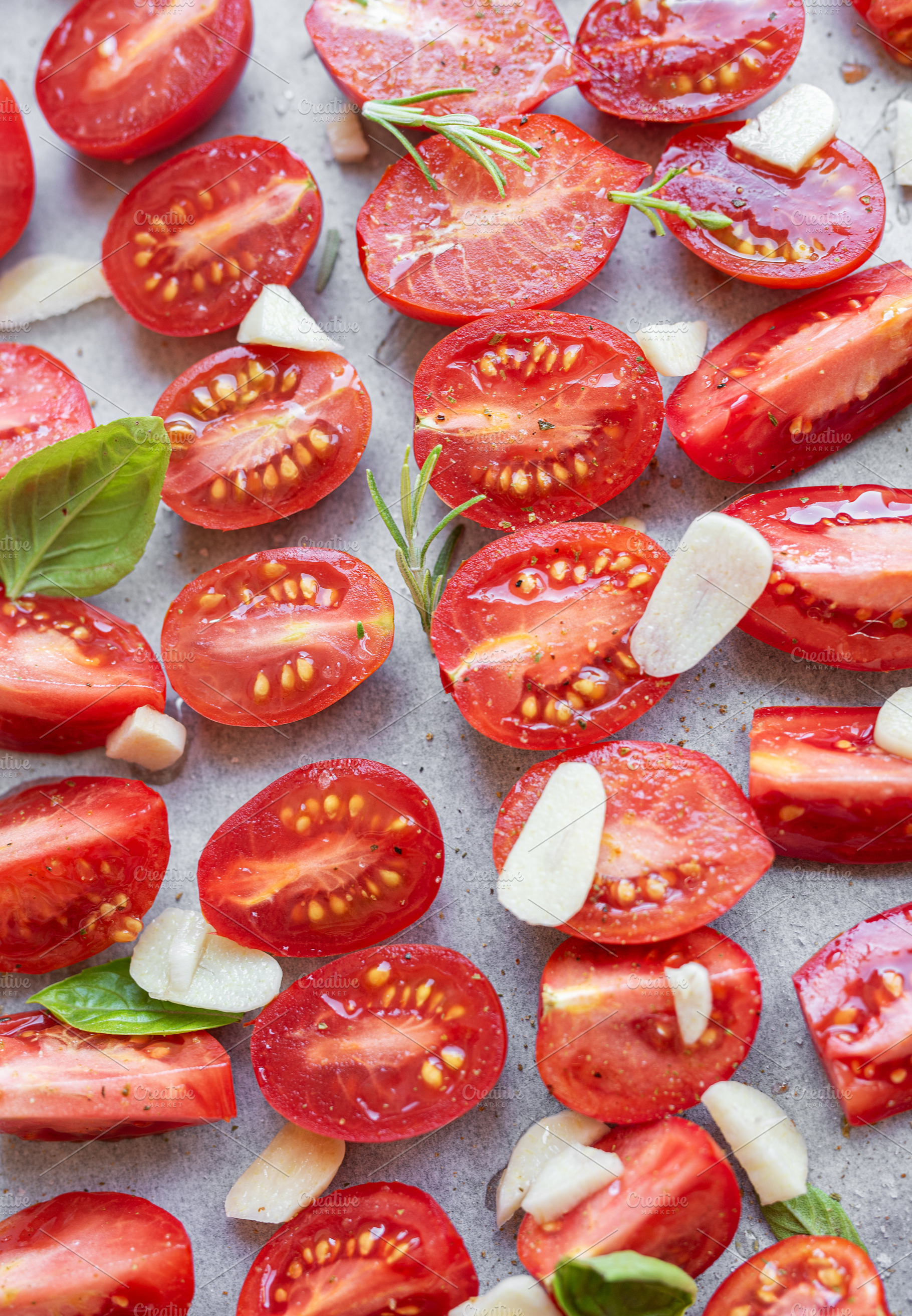 Fresh tomato slices with herbs, a Food & Drink Photo by Olena Rudo
