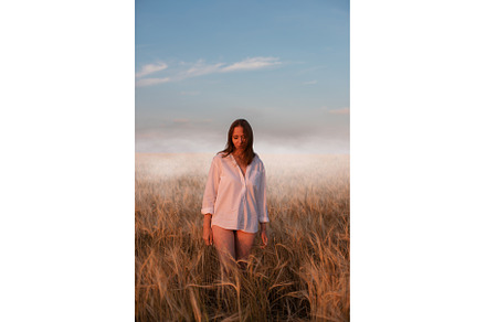 Woman in White Shirt at Sunset in, a Person Photo by Jan Jack Russo Media