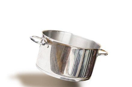Flying empty cooking pot , isolated, a Food & Drink Photo by VICUSCHKA