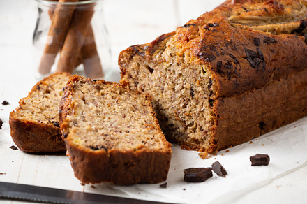Sliced moist banana bread with oats and dark chocolate chunks