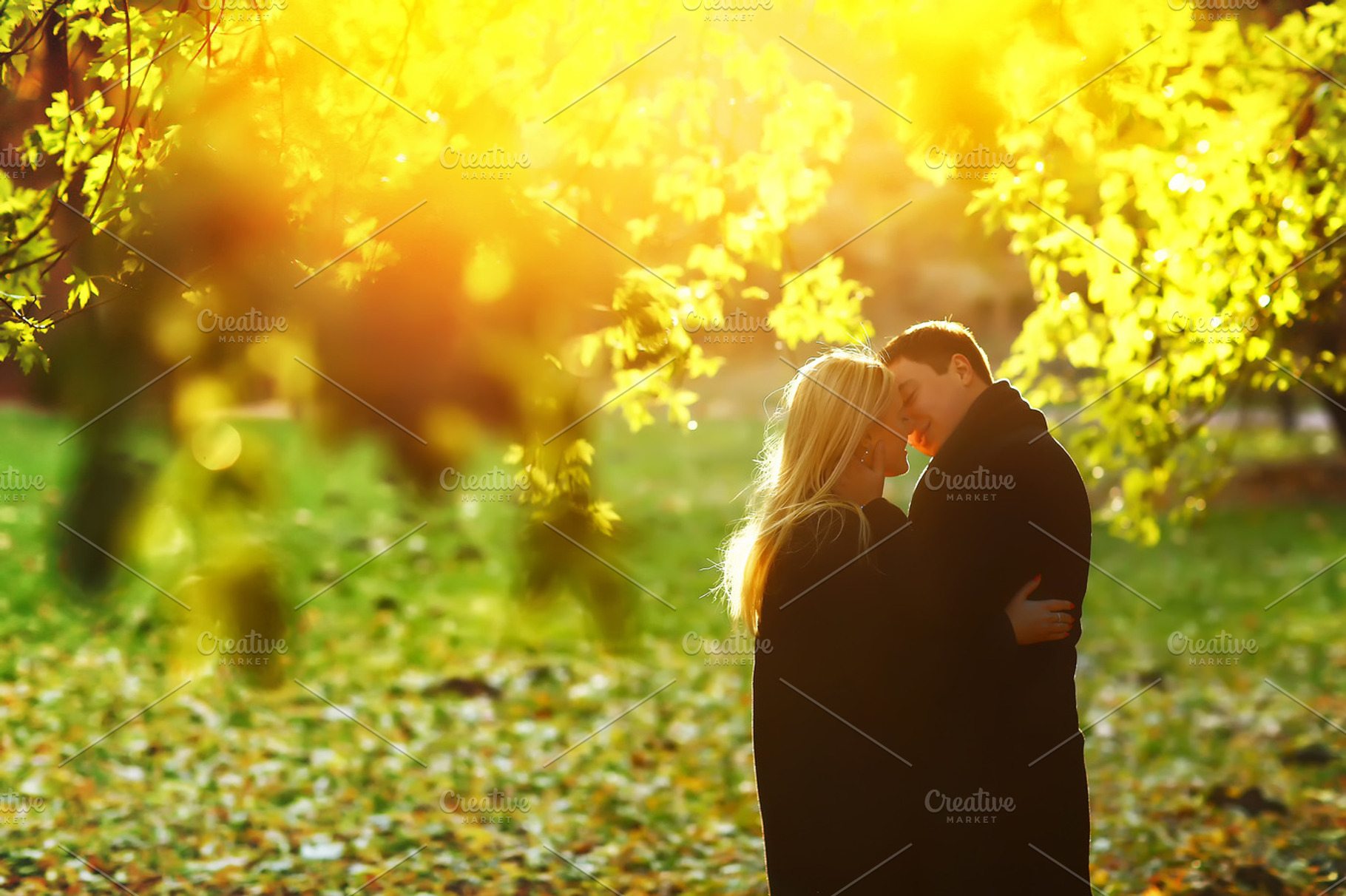Young couple under the tree, a Person Photo by IvashStudio
