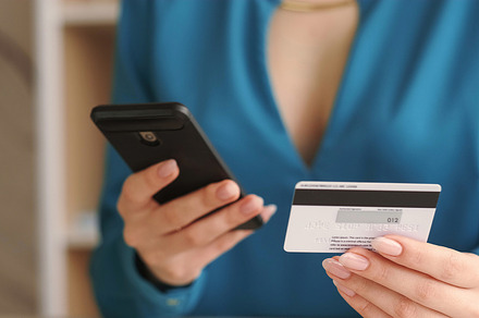 Online transaction phone woman credit card hands, a Technology Photo by Photo Drive Studio