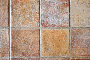 Rrustic tiles in brown tones placed on the wall, an Abstract Photo by Davizro's Market