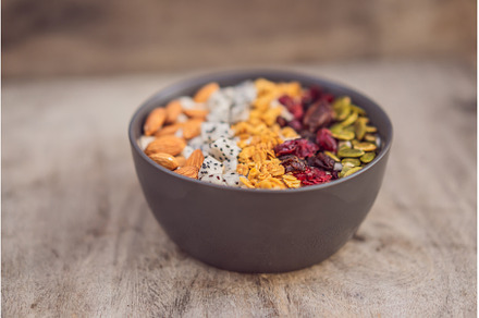 Mango smoothies bowl with almond, a Food & Drink Photo by Elizaveta Galitskaya