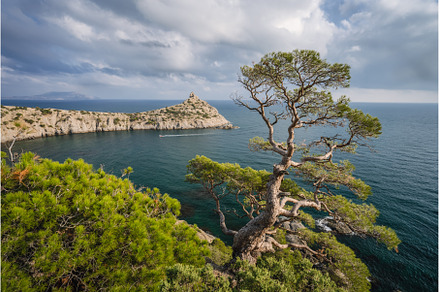 Mountains and sea are on background, a Nature Photo by Igor Tichonow
