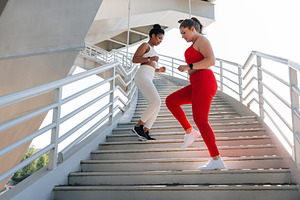 Two young females running, a Sports & Recreation Photo by Artem Varnitsin