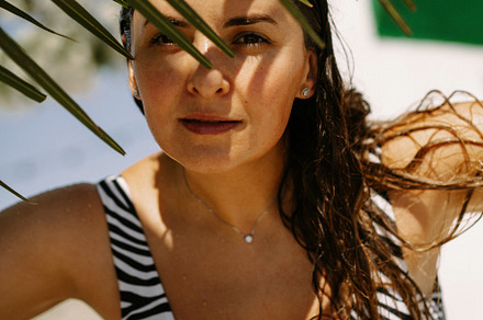 woman on the beach, a Person Photo by EVA.studio