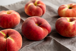 Fresh juicy ripe fig peaches, side view., a Food & Drink Photo by LiudmylaChuhunova