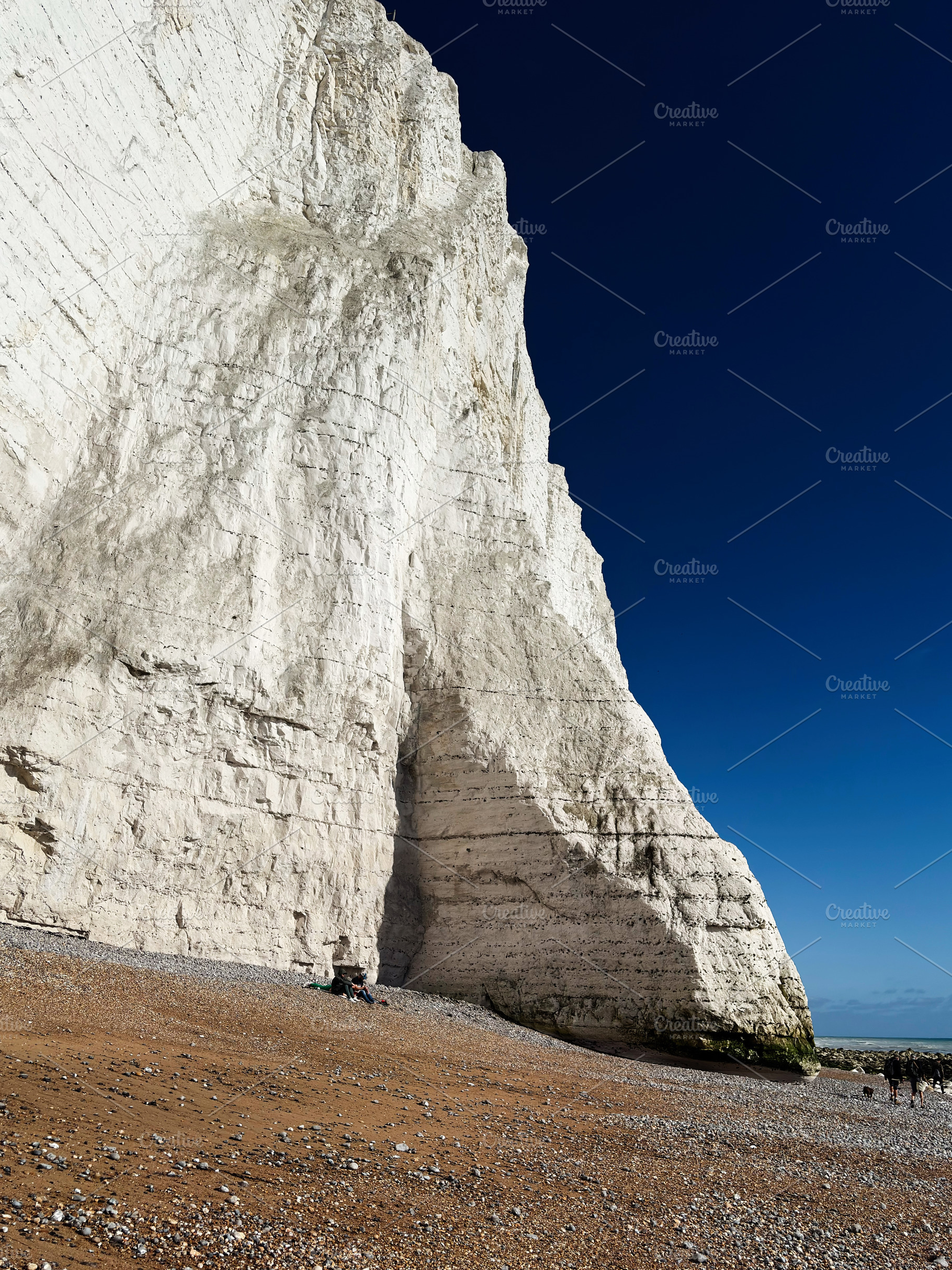 White cliffs at Seven Sisters Cliffs East Sussex a dramatic beach scene with se, a Nature Photo by AS photostudio