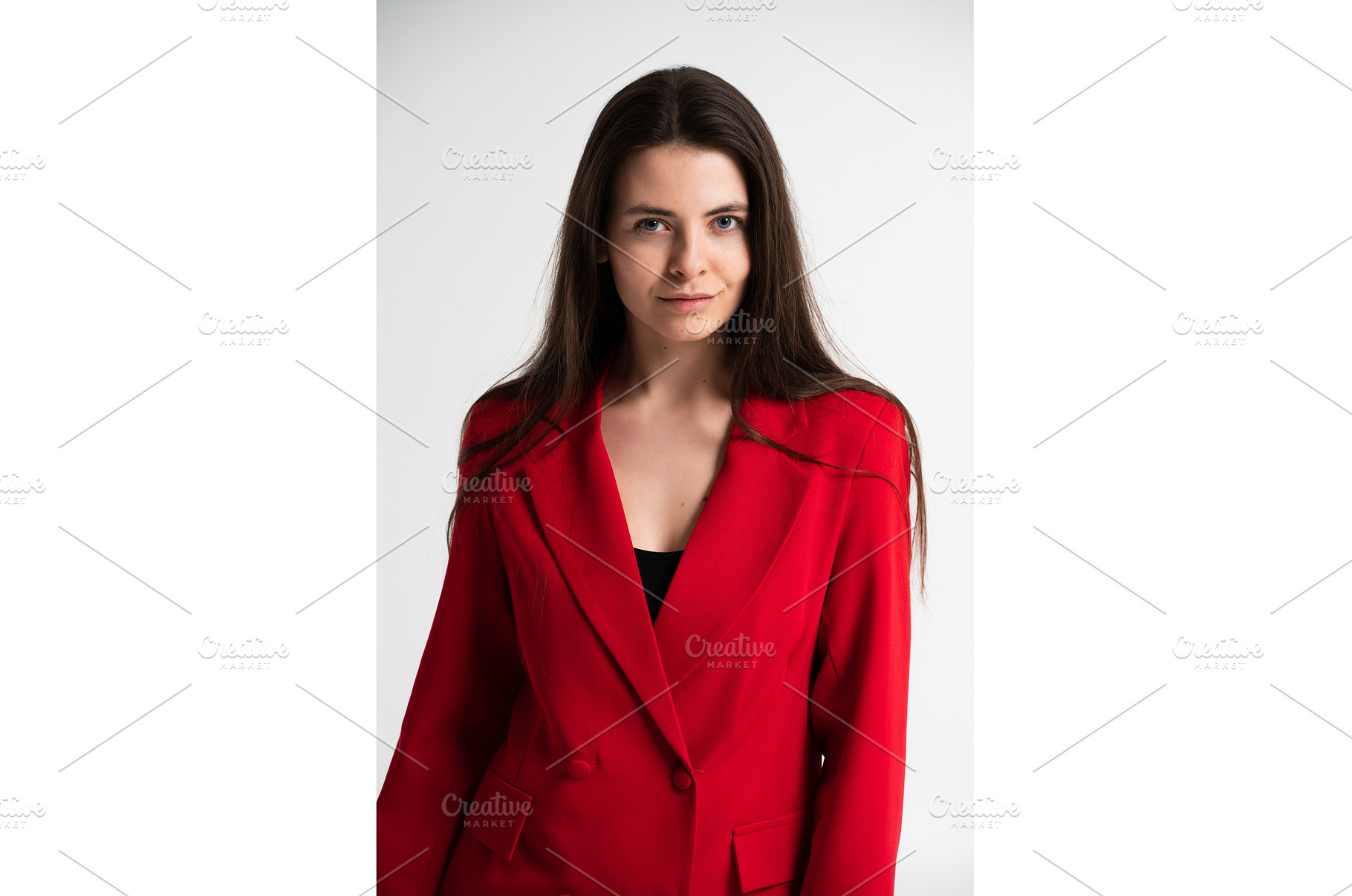 Young woman confidently posing in a, a Business Photo by volodymyrshtun13795