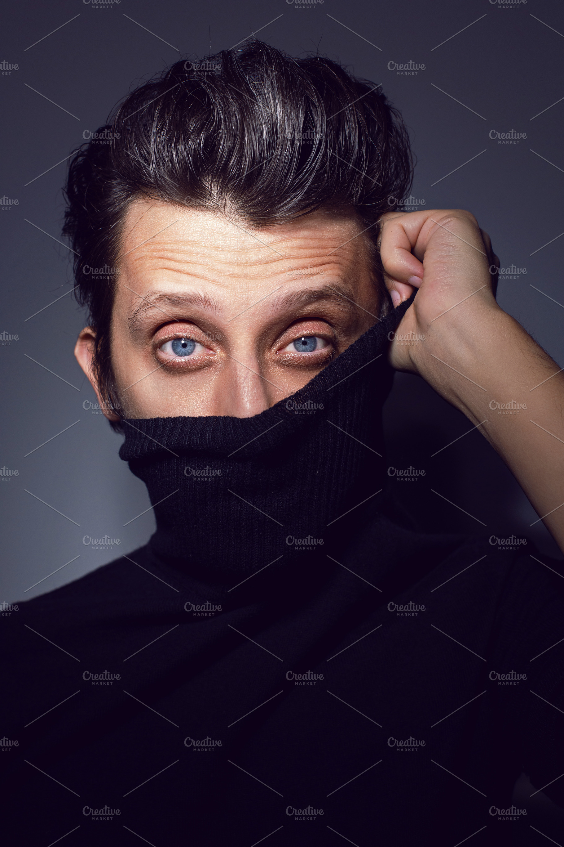 Fashion Portrait of a 35 year old man standing over a light gray background in, a Person Photo by SaulichPhoto
