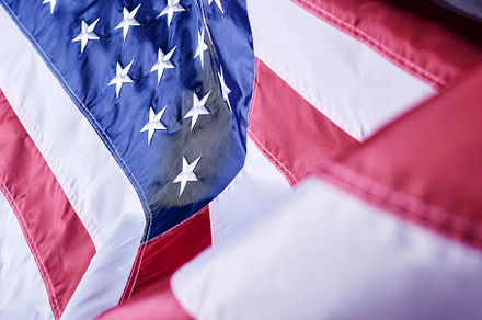 closeup shot of the waving flag of the United States of America, a Photo by 1981 Rustic studio kan