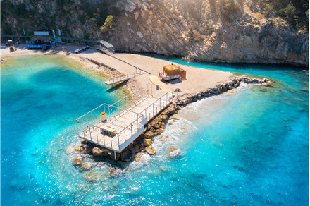 Aerial view of beautiful wooden pier, a Nature Photo by den-belitsky