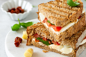 Delicious toast with white asparagus featuring toast, sandwich, and asparagus