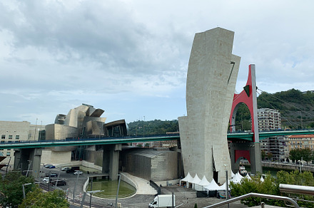 Guggenheim Museum Bilbao with nearby bridge and city view under