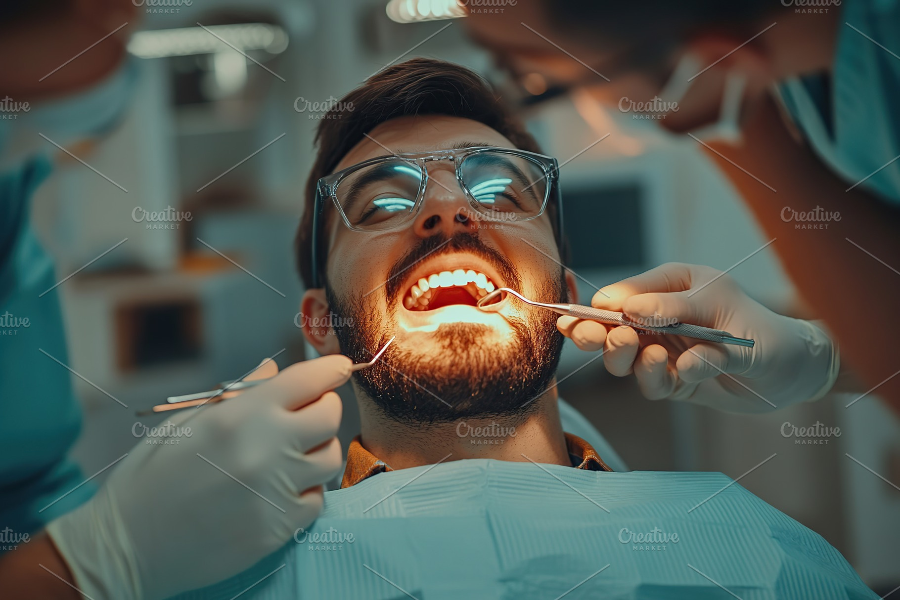 Photo of young man sitting in a dental chair and male dentist treating his teet, a Health & Medical Photo by AlyaAnd