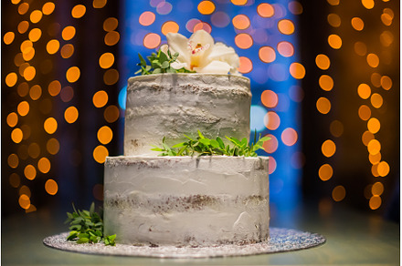 Split-level wedding cake with, a Food & Drink Photo by Elizaveta Galitskaya