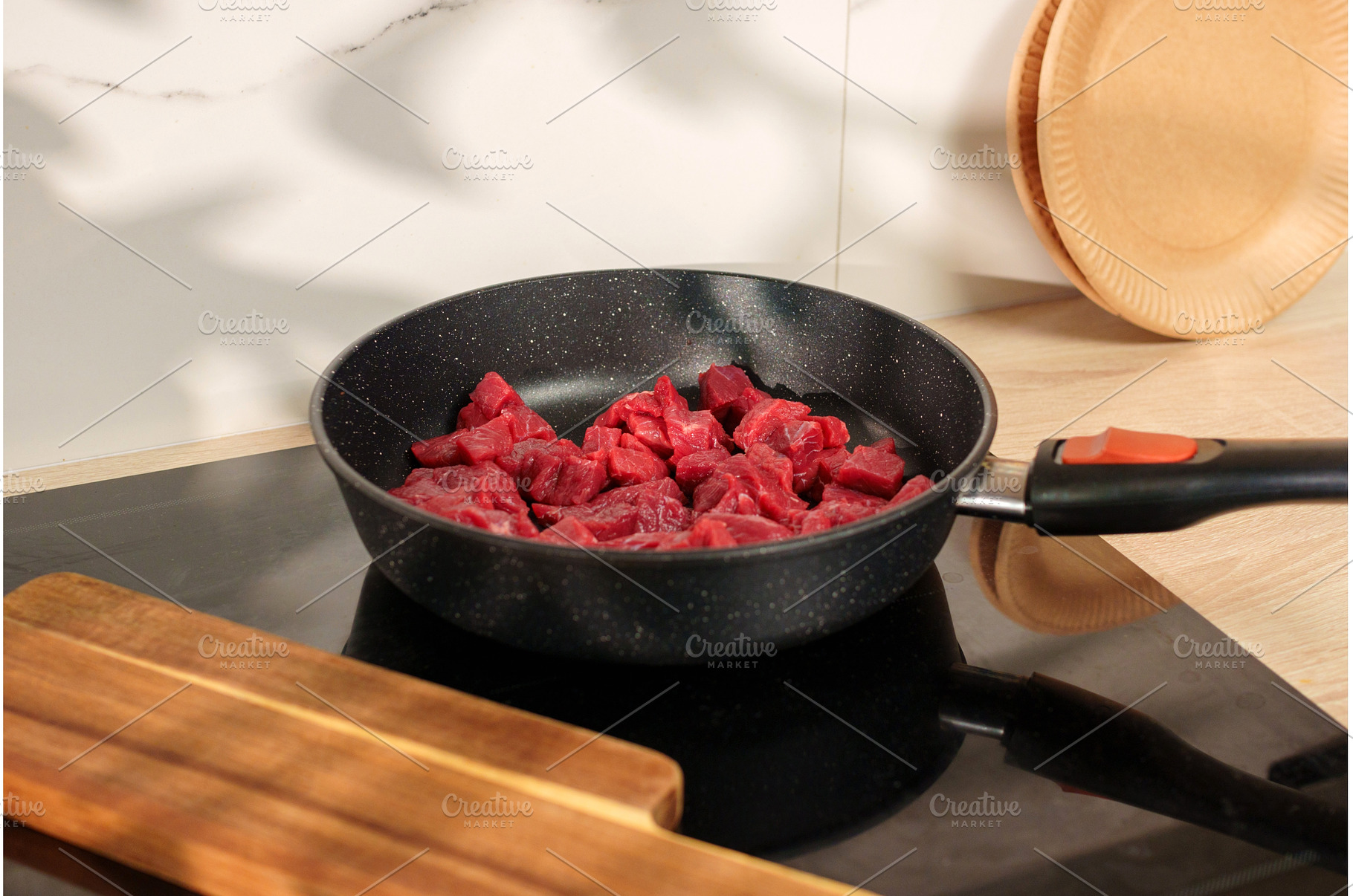 Cooking beef cubes in a modern, a Food & Drink Photo by darksoul72