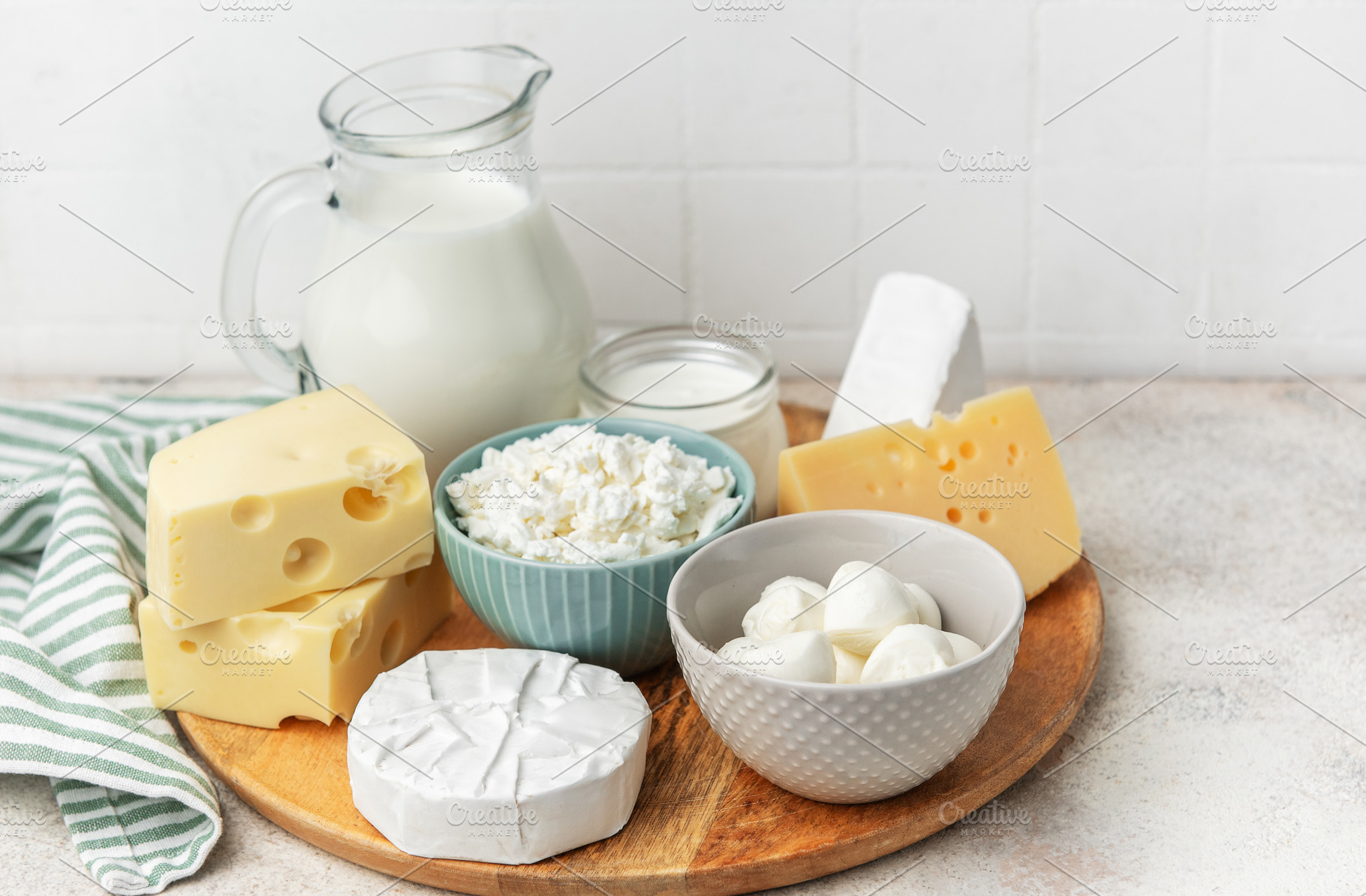 Assortment of fresh dairy products providing healthy nutrition, a Food & Drink Photo by Olena Rudo