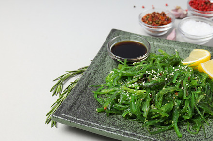 Concept of Japanese cuisine, Chuka salad, space for text, a Food & Drink Photo by AtlasStudio PRO