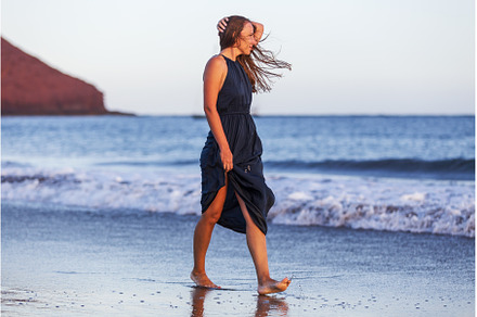 Young lady in long dress enjoying, a Person Photo by serkum