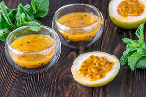 Passion Fruit Pulp in Glass Bowls, a Food & Drink Photo by Alexander Prokopenko