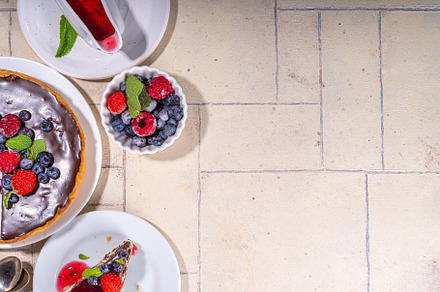 Homemade cheesecake with chocolate and berry, a Food & Drink Photo by Rimma